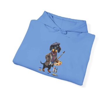 Blue hoodie featuring a dachshund artist illustration with palette and brushes